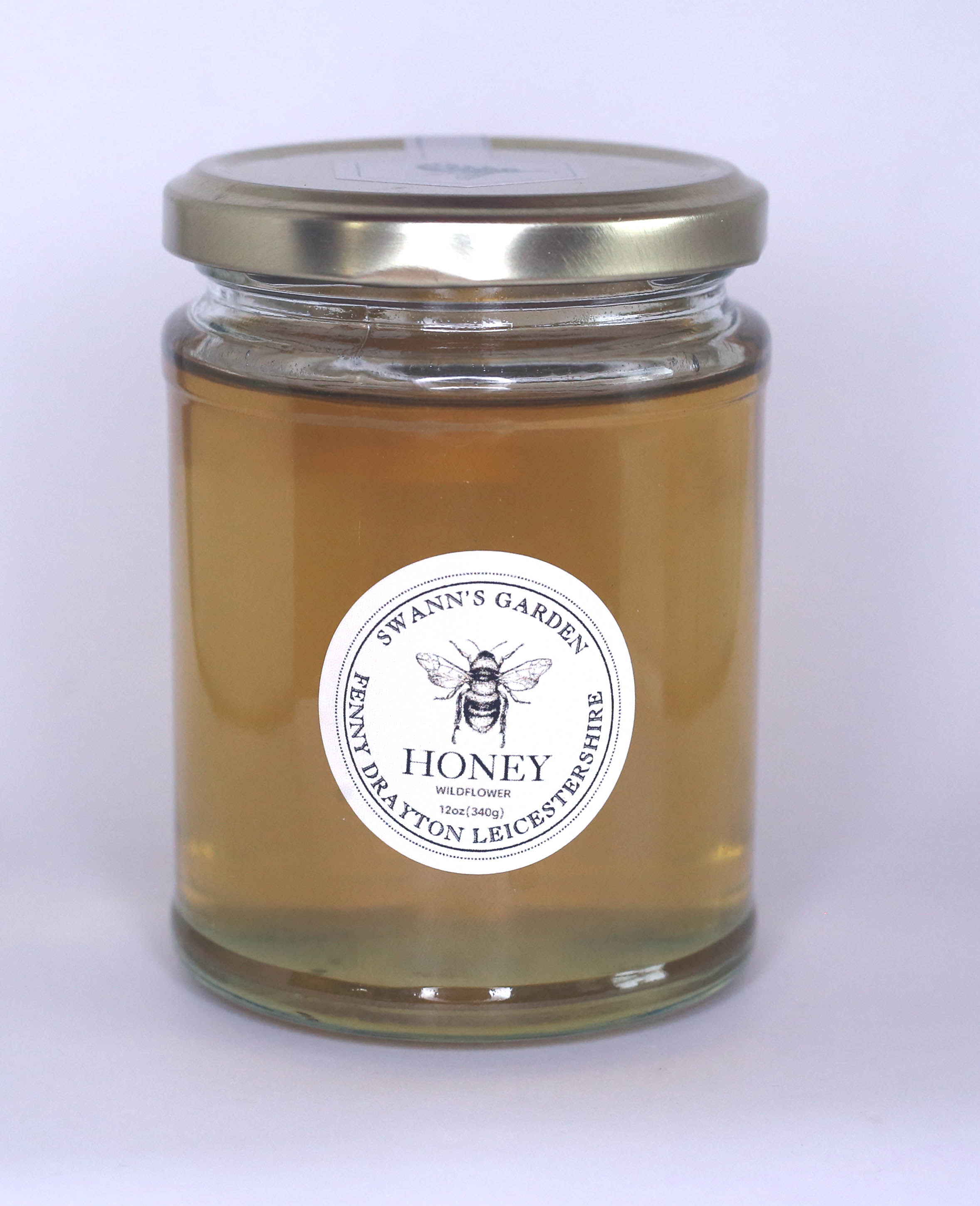 12oz jar of Swann's Garden wildflower honey